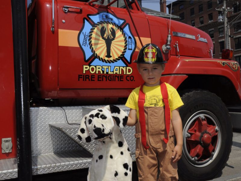 Kid with Dalmatian on Fire Engine Tour, Portland Maine